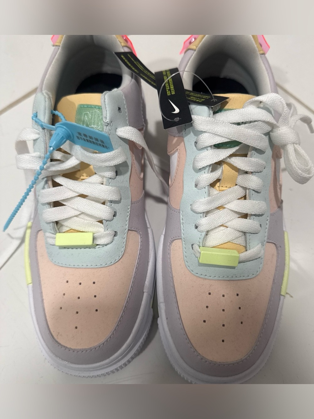 Nike White and Black Low-Top Sneaker Interior Tag